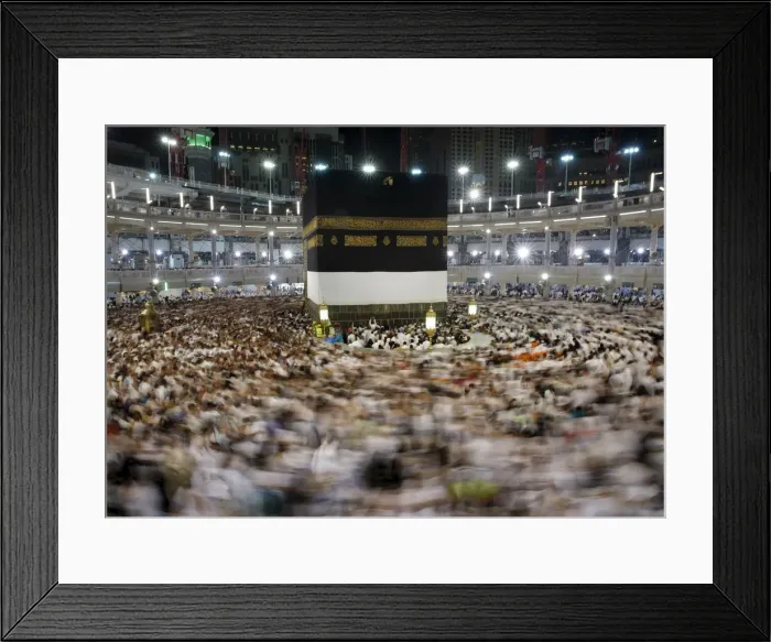 Framed Print : Muslim pilgrims pray around the holy Kaaba at the Grand Mosque ahead of the annual haj