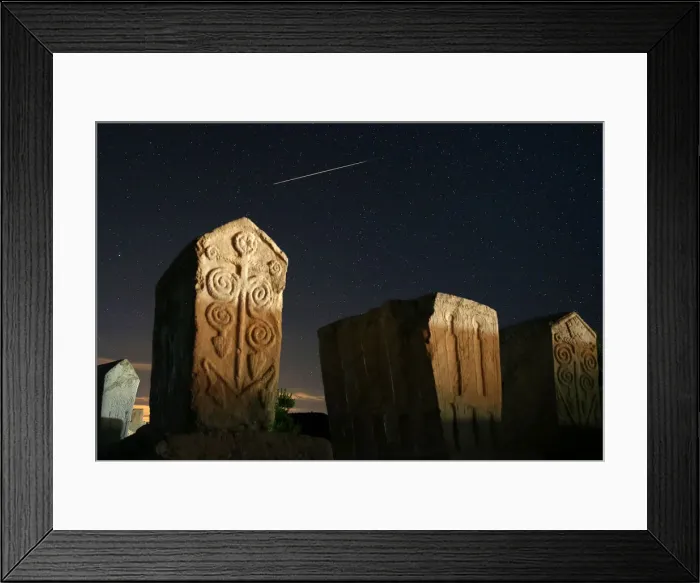 Framed Print : A meteor streaks past stars in the night sky above medieval tombstones in Radmilje near Framed Print : A meteor streaks past stars in the night sky above medieval tombstones in Radmilje near