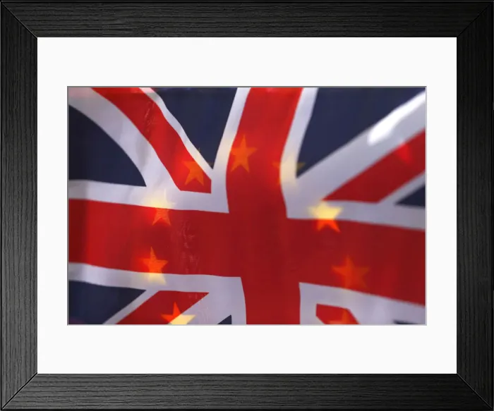 Framed Print : An EU flag is seen through a British Union flag during a pro-EU referendum event Framed Print : An EU flag is seen through a British Union flag during a pro-EU referendum event