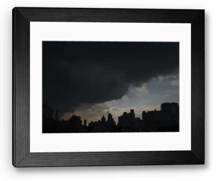 Framed Print : Rain clouds approach buildings in Midtown Manhattan