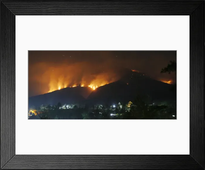 Framed Print : Forest fires on the Arjuna and Welirang mountains are seen from the Pecalukan village of Framed Print : Forest fires on the Arjuna and Welirang mountains are seen from the Pecalukan village of