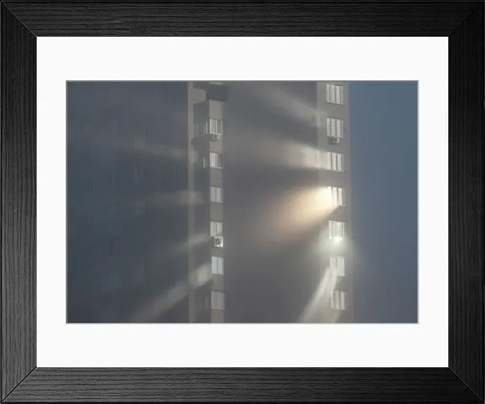 Framed Print : Sunlight reflects from windows of an apartment building on a foggy autumn day in Kiev