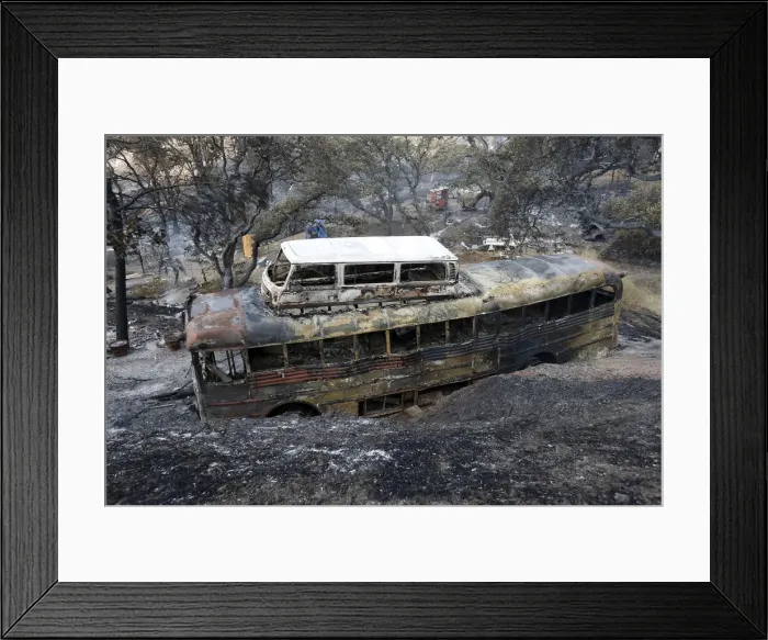 Framed Print : The remains of vehicle burned by Rocky Fire is seen near Clearake, California Framed Print : The remains of vehicle burned by Rocky Fire is seen near Clearake, California
