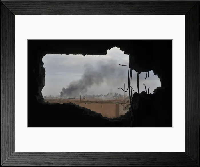 Framed Print : Smoke rises due to clashes between Free Syrian Army fighters