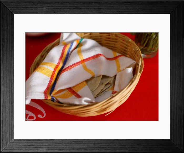 Framed Print : Corn tortillas are seen in a basket in Mexico City Framed Print : Corn tortillas are seen in a basket in Mexico City