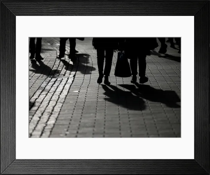 Framed Print : People walk down the street during the start of winter sales in downtown Strasbourg Framed Print : People walk down the street during the start of winter sales in downtown Strasbourg