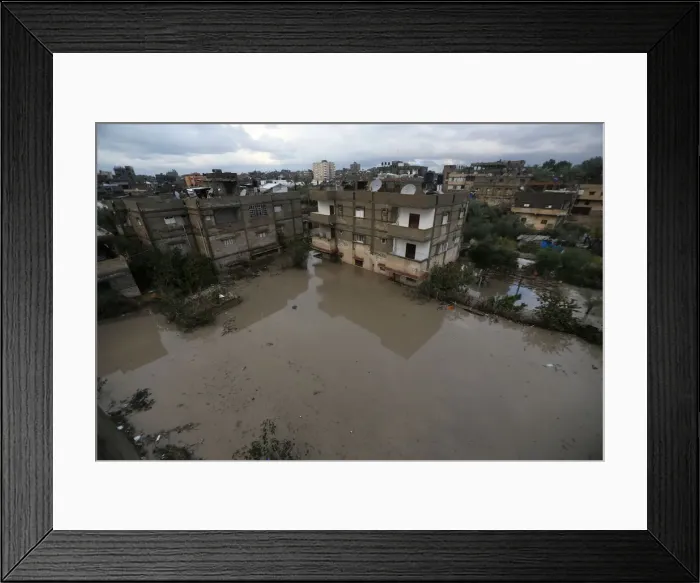 Framed Print : Flooded houses are seen following heavy rains in Rafah in the southern Gaza Strip