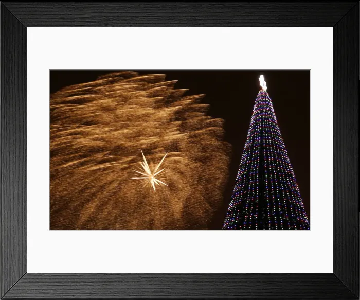 Framed Print : Fireworks light the sky during Orthodox Christmas celebrations in Krasnoyarsk