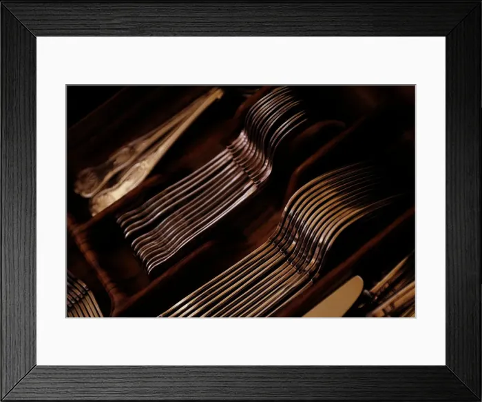 Framed Print : Silver cutlery is seen stored in a drawer at a private home in Valletta