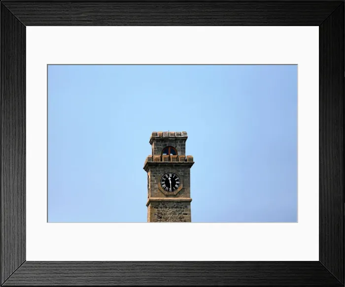 Framed Print : A clock tower is seen on top of the Galle Dutch Fort in Galle Framed Print : A clock tower is seen on top of the Galle Dutch Fort in Galle