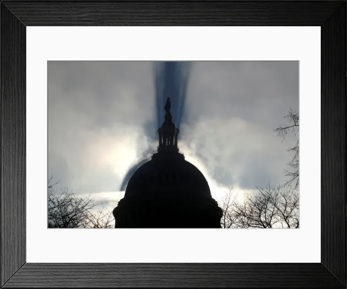 Framed Print : Early morning fog creates a shadow of the U. S. Capitol dome in Washington
