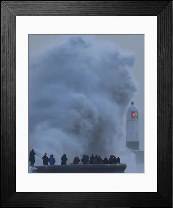 Framed Print : People view large waves and high winds associated with Storm Eleanor as they hit