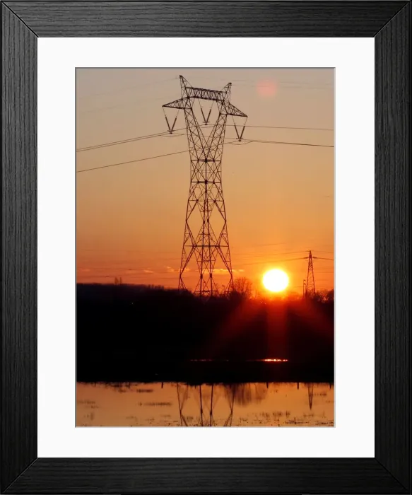 Framed Print : Pylons of high-tension electricity power lines are seen during sunset in Bordeaux