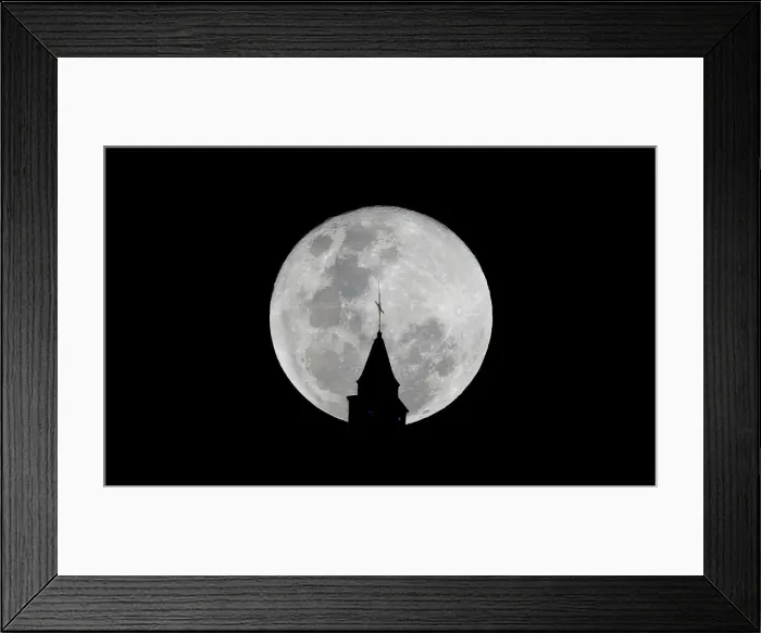 Framed Print : A supermoon is pictured next to the Monserrate church in Bogota Framed Print : A supermoon is pictured next to the Monserrate church in Bogota