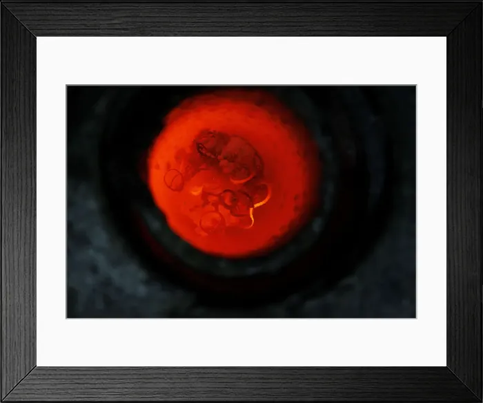 Framed Print : Gold jewelry glows red hot as it is smelted down in a crucible at Dvir & Stoler Refining Framed Print : Gold jewelry glows red hot as it is smelted down in a crucible at Dvir & Stoler Refining