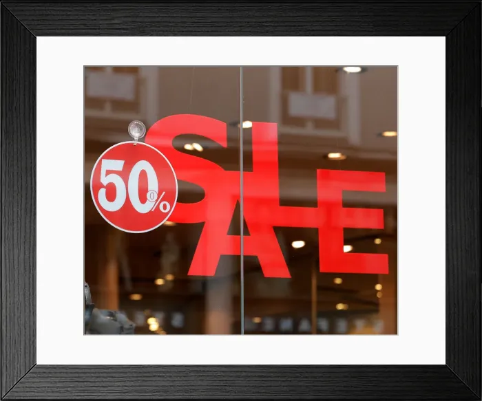 Framed Print : A shop advertises winter sale in the centre of Vienna Framed Print : A shop advertises winter sale in the centre of Vienna