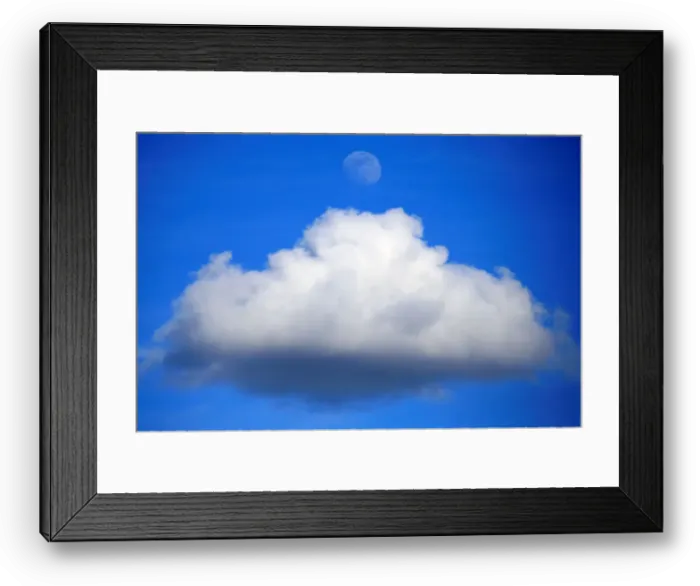 Framed Print : The moon is seen over a cumulus cloud in the skies over Avesnes-Lez-Aubert Framed Print : The moon is seen over a cumulus cloud in the skies over Avesnes-Lez-Aubert