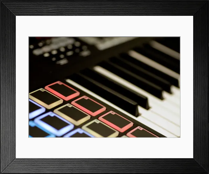Framed Print : A sequencer and keyboard are displayed at a music store in Singapore Framed Print : A sequencer and keyboard are displayed at a music store in Singapore