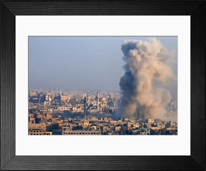 Framed Print : Smoke rises as seen from a government-held area of Aleppo Framed Print : Smoke rises as seen from a government-held area of Aleppo