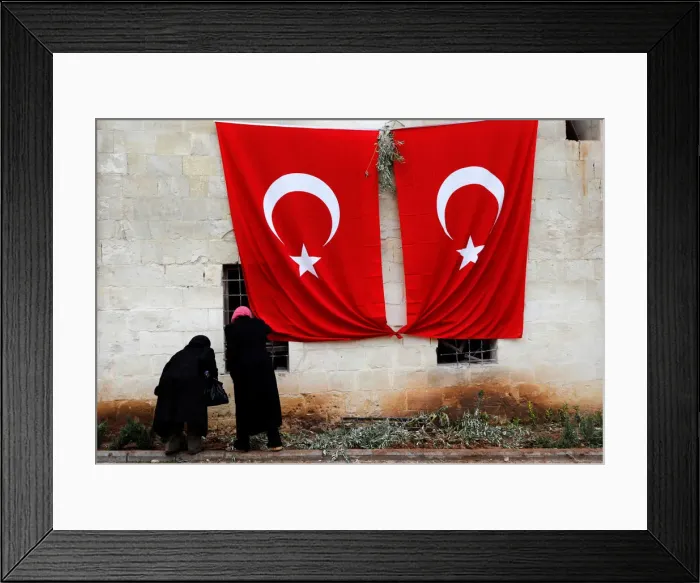 Framed Print : Women inspect a mosque which was hit by a rocket fired from Syria Framed Print : Women inspect a mosque which was hit by a rocket fired from Syria