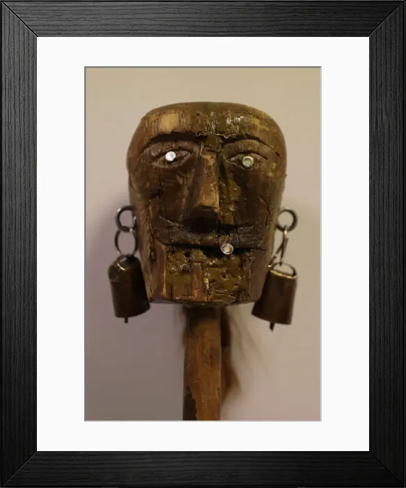 Framed Print : A figure on the top of a stick used by a believer is seen before the Endiablada Framed Print : A figure on the top of a stick used by a believer is seen before the Endiablada