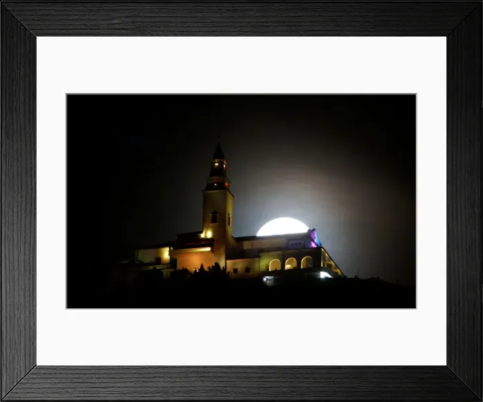 Framed Print : A supermoon is pictured next to the Monserrate church in Bogota Framed Print : A supermoon is pictured next to the Monserrate church in Bogota