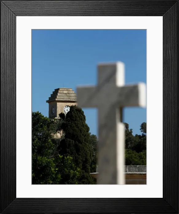 Framed Print : The Saint Patricks Barracks clock tower is seen from the Pembroke Military Cemetery in