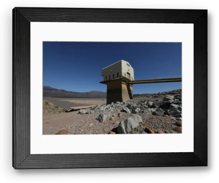 Framed Print : Water levels are seen at about 24 percent full at Voelvlei Dam near Cape Town