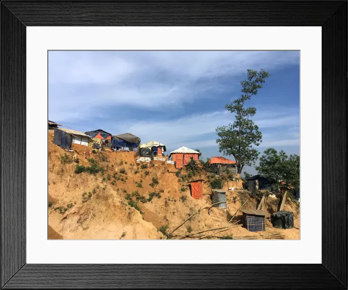 Framed Print : Shacks cling to a landslide-prone hill in the Balukhali camp for Rohingya refugees in Framed Print : Shacks cling to a landslide-prone hill in the Balukhali camp for Rohingya refugees in