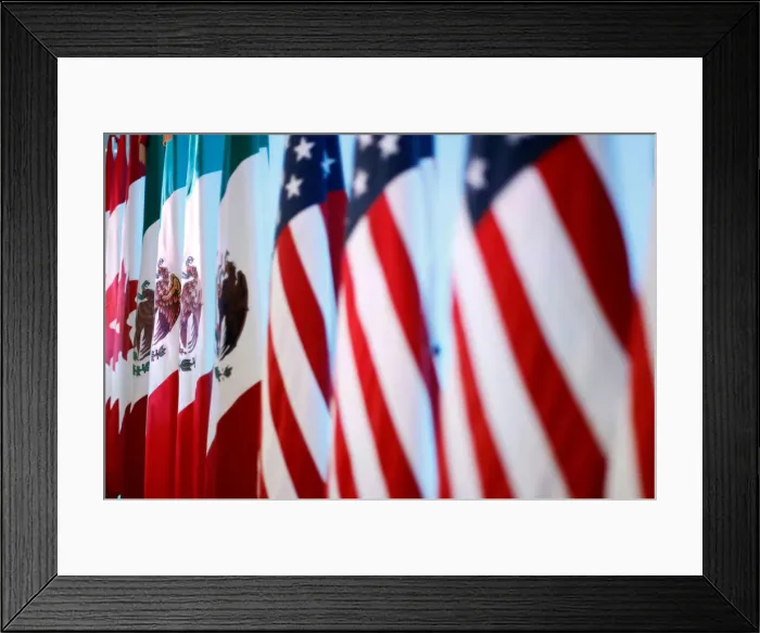 Framed Print : Flags of Canada, Mexico and the U. S. are seen before a joint news conference on Framed Print : Flags of Canada, Mexico and the U. S. are seen before a joint news conference on