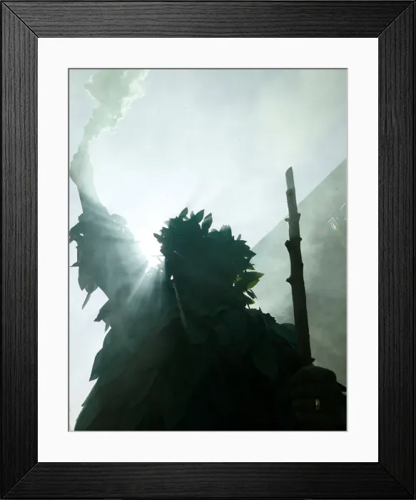 Framed Print : A participant takes part in the annual May bank holiday Jack In The Green parade Framed Print : A participant takes part in the annual May bank holiday Jack In The Green parade