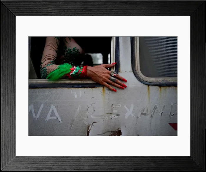 Framed Print : A gay rights activist sits in a bus during the 11th annual March against Homophobia