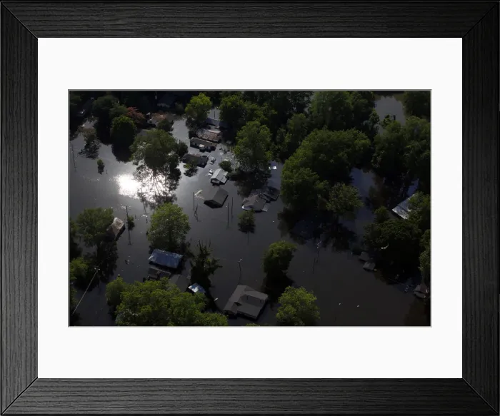 Framed Print : Floodwaters inundate a neighborhood in Vicksburg, Mississippi Framed Print : Floodwaters inundate a neighborhood in Vicksburg, Mississippi