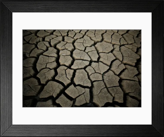 Framed Print : Caked mud is seen at Theewaterskloof dam near Cape Town