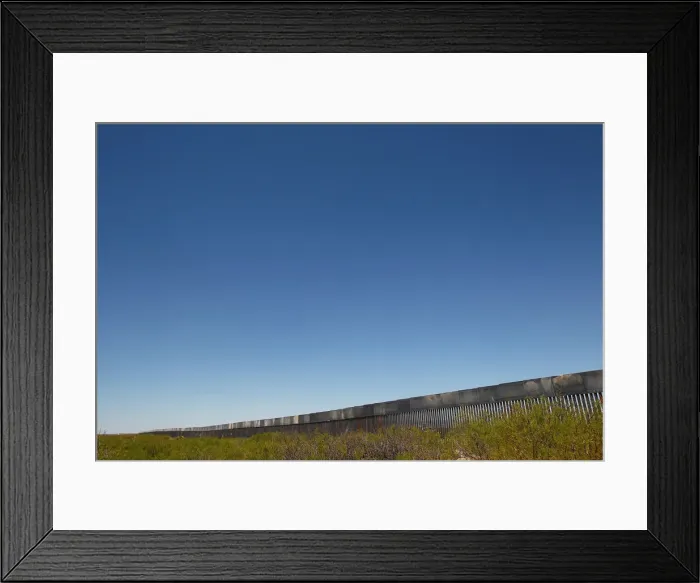 Framed Print : A general view shows a new section of bollard wall in Santa Teresa as seen from Framed Print : A general view shows a new section of bollard wall in Santa Teresa as seen from