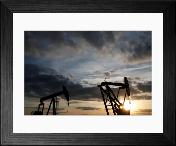 Framed Print : Oil pumps are seen at sunset outside Vaudoy-en-Brie Framed Print : Oil pumps are seen at sunset outside Vaudoy-en-Brie