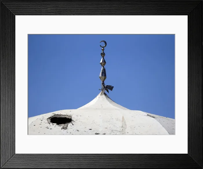 Framed Print : A damaged mosque is seen during a media tour in Douma near Damascus Framed Print : A damaged mosque is seen during a media tour in Douma near Damascus