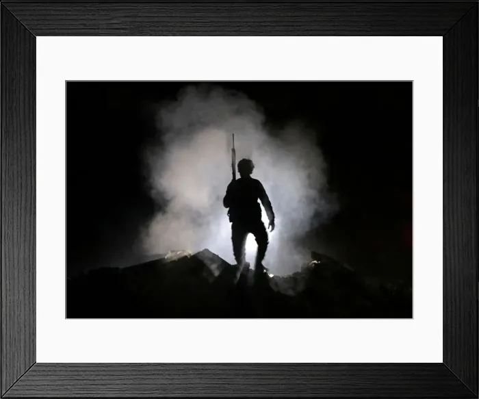 Framed Print : Turkey-backed Free Syrian Army fighter holds a weapon in the town of Tadef in Aleppo