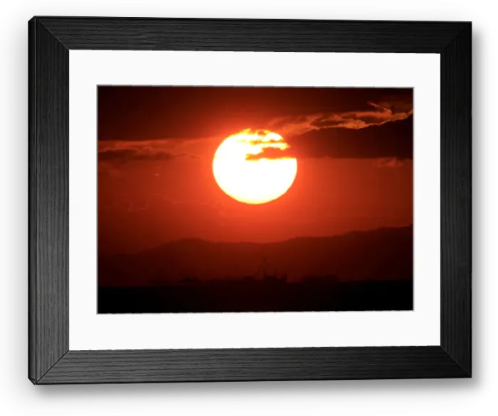 Framed Print : Fishing boats are pictured during sunset at a Manila Bay in Pasay Framed Print : Fishing boats are pictured during sunset at a Manila Bay in Pasay