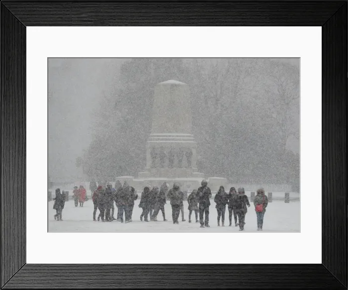 Framed Print : People walk in the snow on Horse Guards Parade in London Framed Print : People walk in the snow on Horse Guards Parade in London