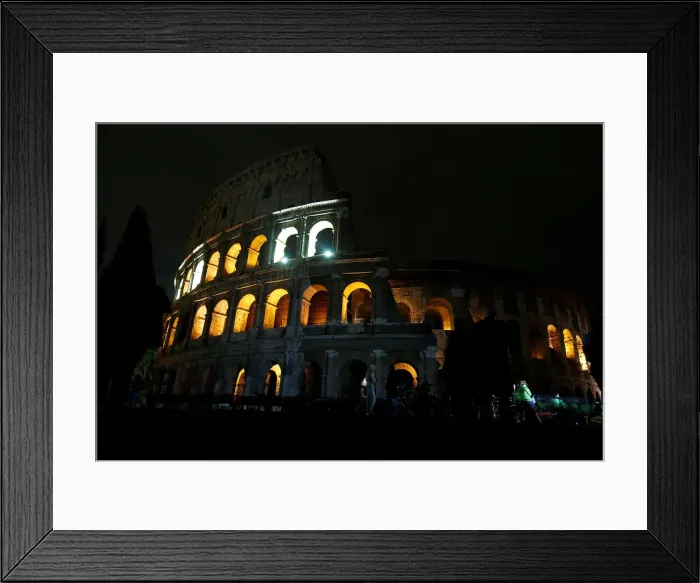 Framed Print : The ancient Colosseum is seen before the lights are switched off for Earth Hour in Rome Framed Print : The ancient Colosseum is seen before the lights are switched off for Earth Hour in Rome