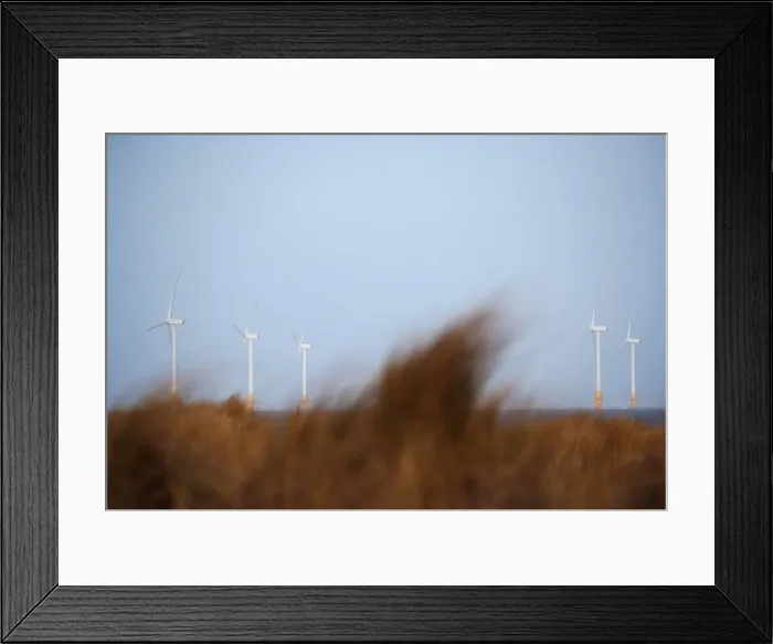 Framed Print : An offshore wind farm is seen from Great Yarmouth