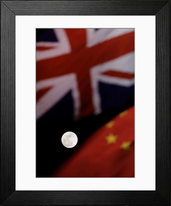 Framed Print : The super blue moon is seen between British and Chinese flags raised at Tiananmen square Framed Print : The super blue moon is seen between British and Chinese flags raised at Tiananmen square