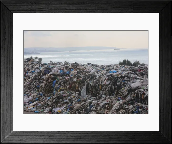 Framed Print : Piled up garbage is seen in Jiyeh