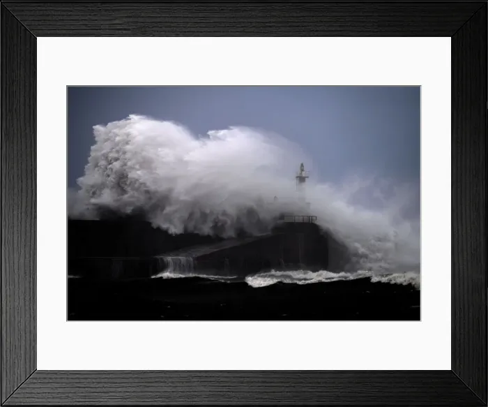 Framed Print : Huge waves crash on the San Esteban de Pravia seafront in Asturias region
