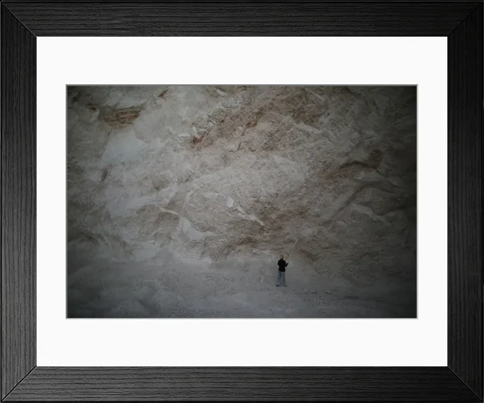 Framed Print : A man uses a long stick to hit rocks and get sand in a sand mine on the outskirts of Fond Framed Print : A man uses a long stick to hit rocks and get sand in a sand mine on the outskirts of Fond