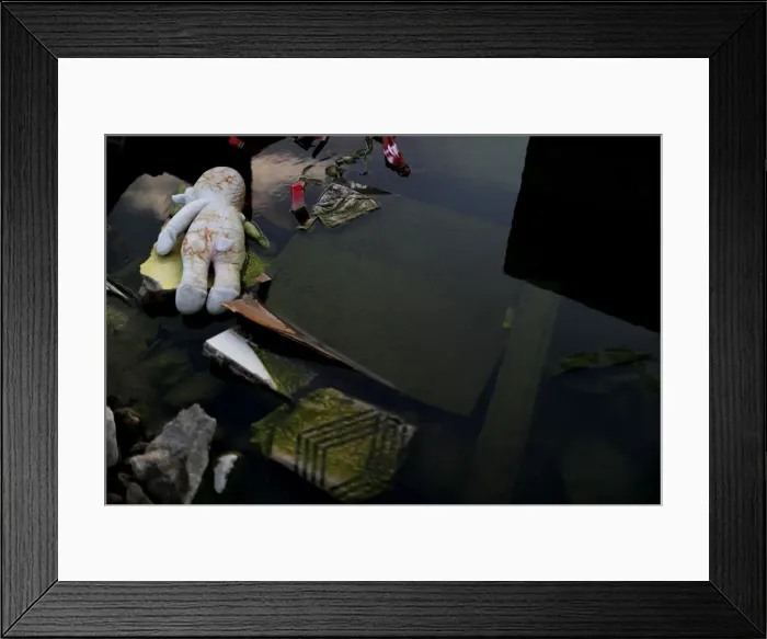 Framed Print : The Wider Image: Seeking talismans of former lives in quake rubble Framed Print : The Wider Image: Seeking talismans of former lives in quake rubble