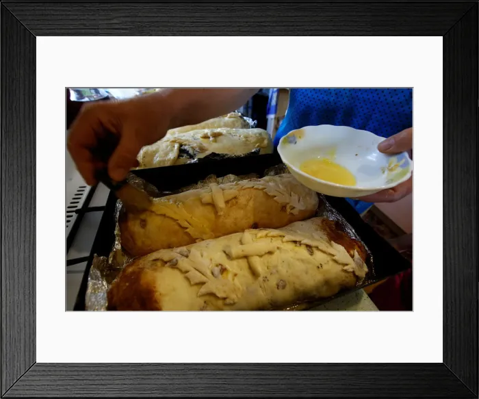 Framed Print : Woman bakes traditional cakes on the eve of Orthodox Easter in the town of Bobruisk