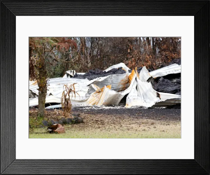 Framed Print : Wreckage of a structure is evident in a lava flow in the Leilani Estates subdivision Framed Print : Wreckage of a structure is evident in a lava flow in the Leilani Estates subdivision