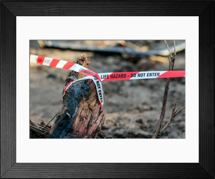 Framed Print : Life hazard tape surrounds a property after a mudslide in Montecito, California Framed Print : Life hazard tape surrounds a property after a mudslide in Montecito, California